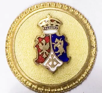Odznaka patriotyczna z trójpolową tarczą herbową