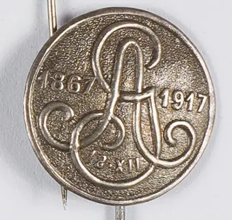 Odznaka jubileuszowa z monogramem GA i datą 1867-1917