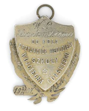 Żeton Koła Przyjaciół Młodzieży Szkoły Wojciecha Górskiego w Warszawie 1907