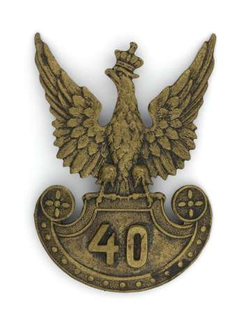 Orzeł wzór 19 o nietypowym rysunku (E.M. Unger Lwów ?) 40 Pułk Piechoty
