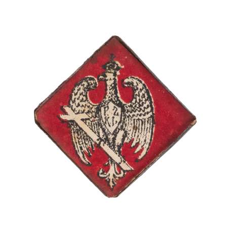 Odznaka patriotyczna Orzeł siedzący na krzyżu