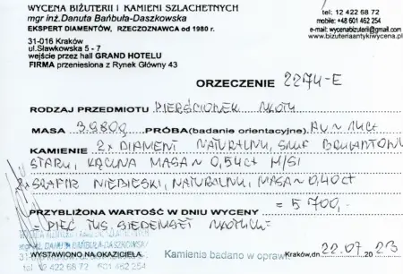 Pierścionek złoty z szafirem i diamentami