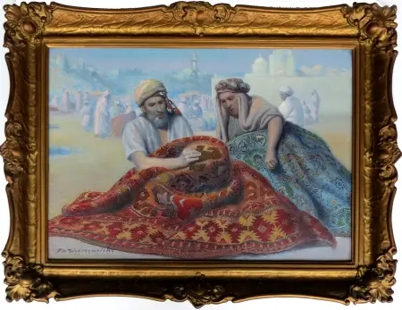 Arab naprawiający dywan