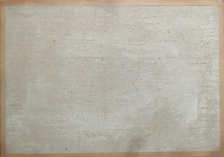 Arab naprawiający dywan