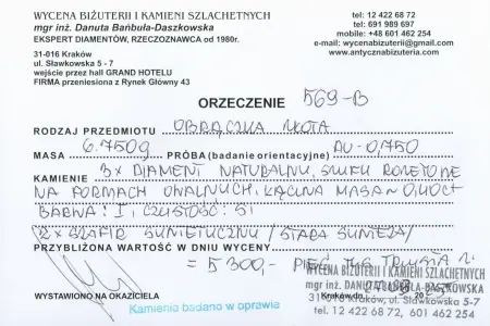 Obrączka złota z rozetami diamentowymi