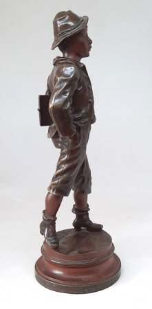 Figura z brązu Uczeń sygn. Marcel Debut