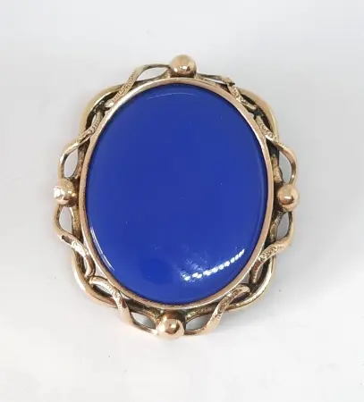 Broszka - sekretnik z niebieską emalią