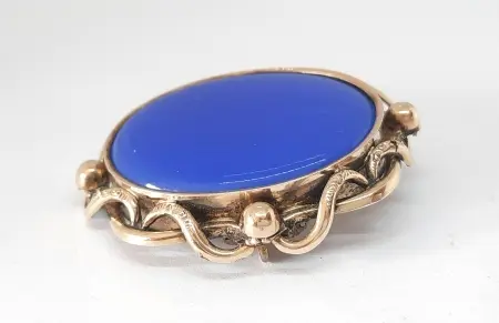 Broszka - sekretnik z niebieską emalią