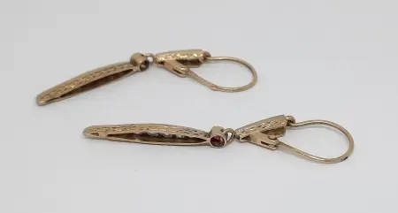 Złote kolczyki z rubinami i rozetami diamentowymi