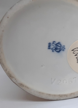 Para porcelanowych figurek Kwiaciarka i Ptasznik 